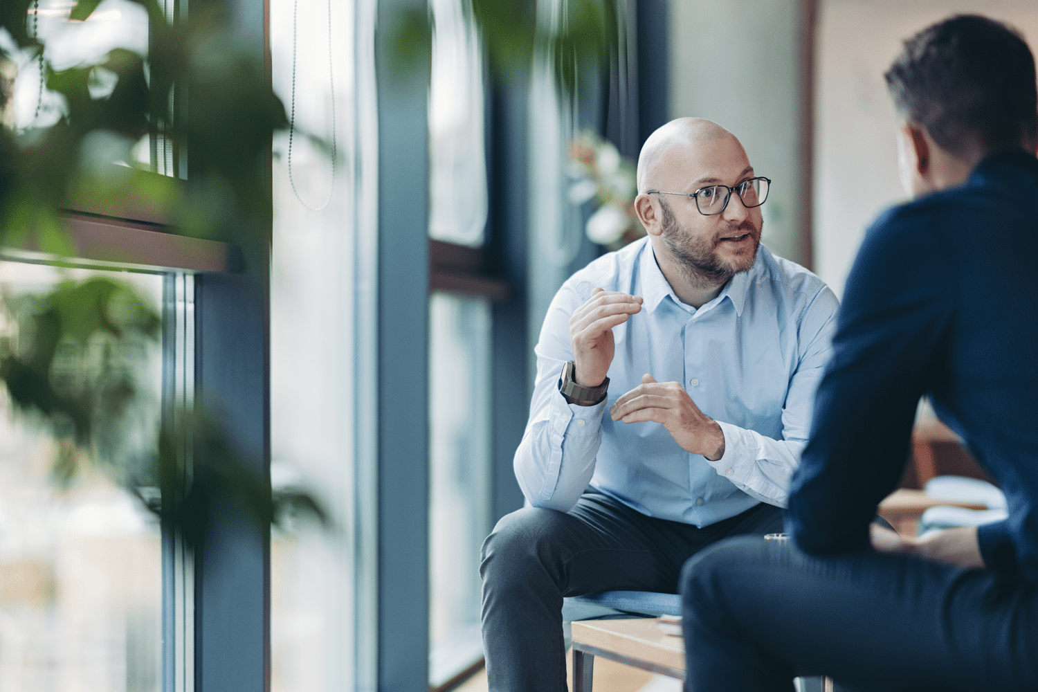 Two business men having a conversation