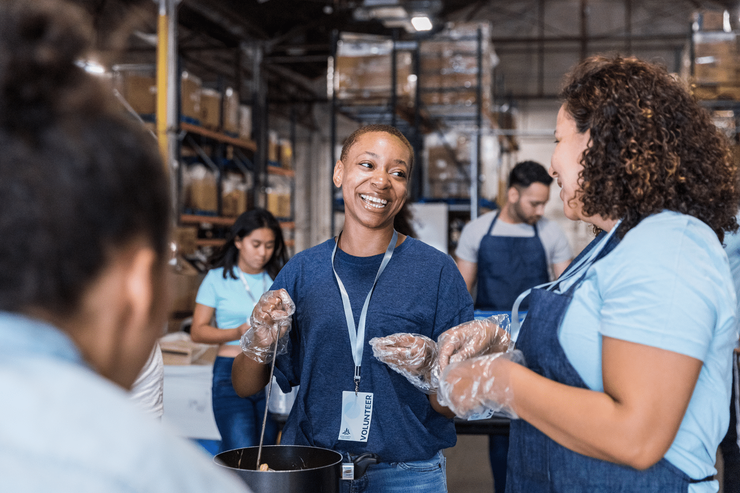 Volunteer working at a food line